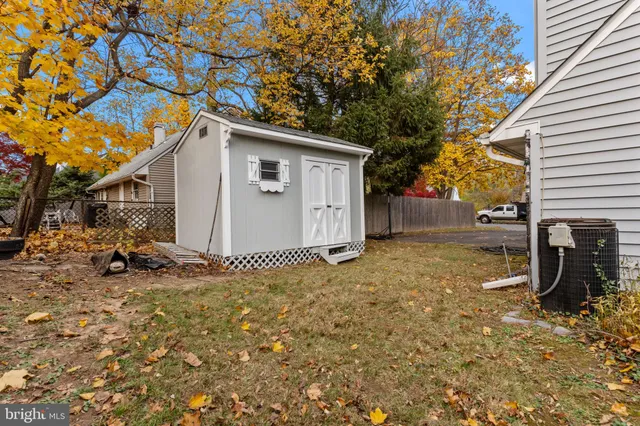 a backyard of a house with shower