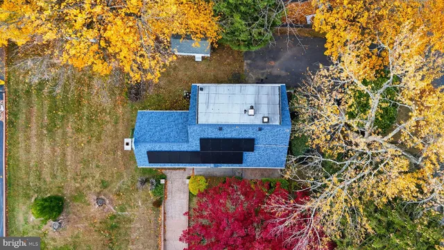 an aerial view of residential building with parking space