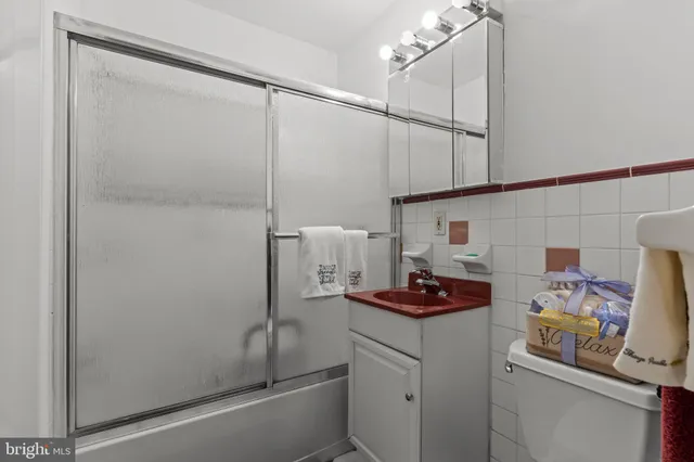 a bathroom with a sink and a shower