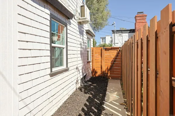 a view of a balcony with wooden floor and stairs