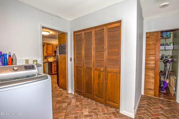 a room that has a bed and a closet