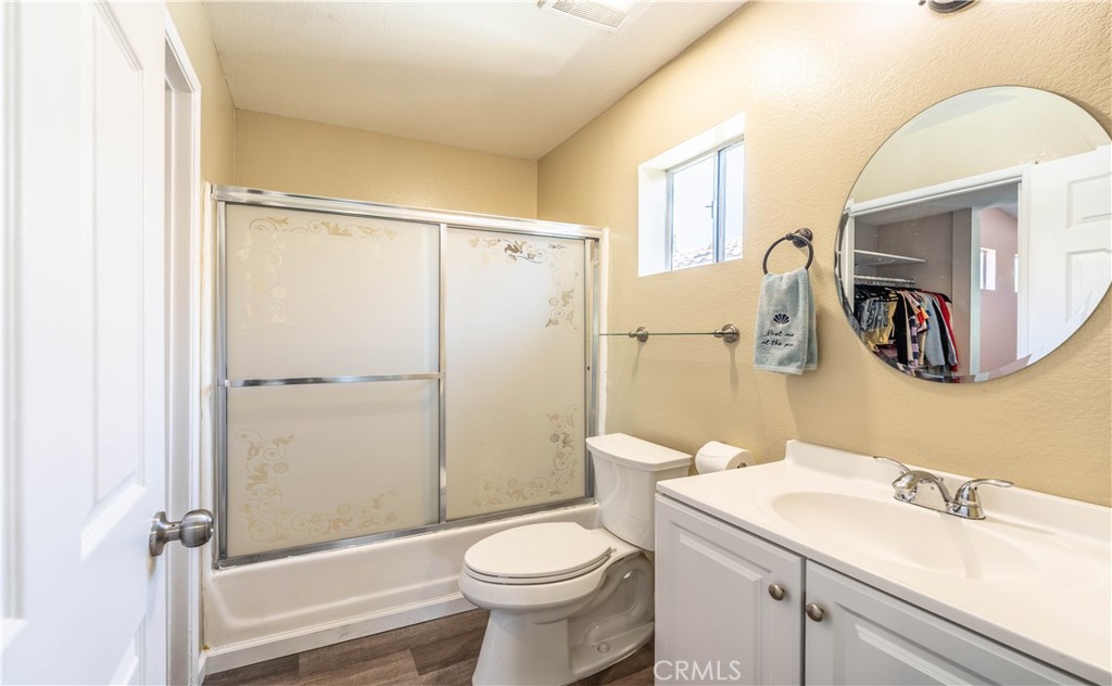 102 Vía Contento Rancho Santa Margarita, CA 92688 - Photo 13 of 40 a bathroom with a sink toilet and shower