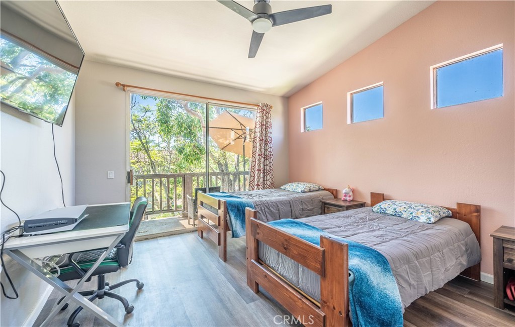 102 Vía Contento Rancho Santa Margarita, CA 92688 - Photo 15 of 40 a bedroom with a bed and a table