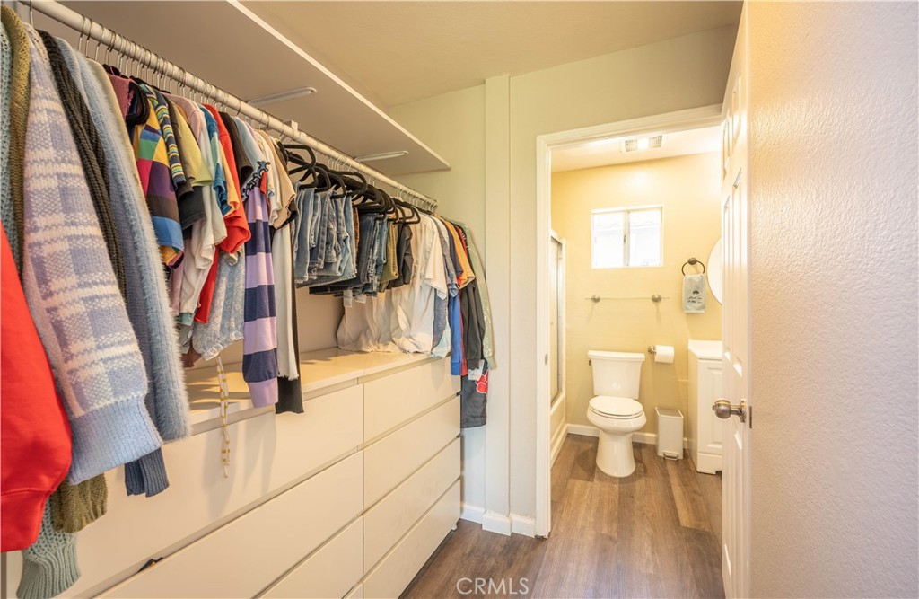 102 Vía Contento Rancho Santa Margarita, CA 92688 - Photo 17 of 40 a view of walk in closet with clothes and shoes
