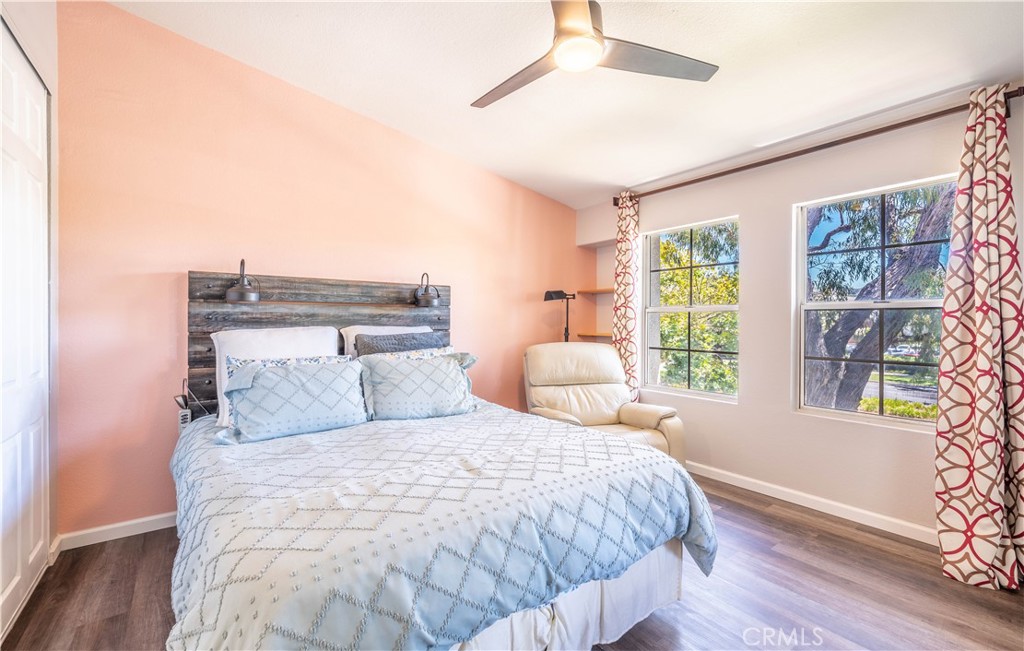 102 Vía Contento Rancho Santa Margarita, CA 92688 - Photo 22 of 40 a bedroom with a large bed and a window