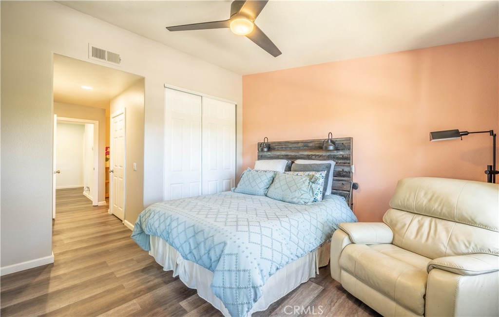 102 Vía Contento Rancho Santa Margarita, CA 92688 - Photo 23 of 40 a bedroom with a bed and couch