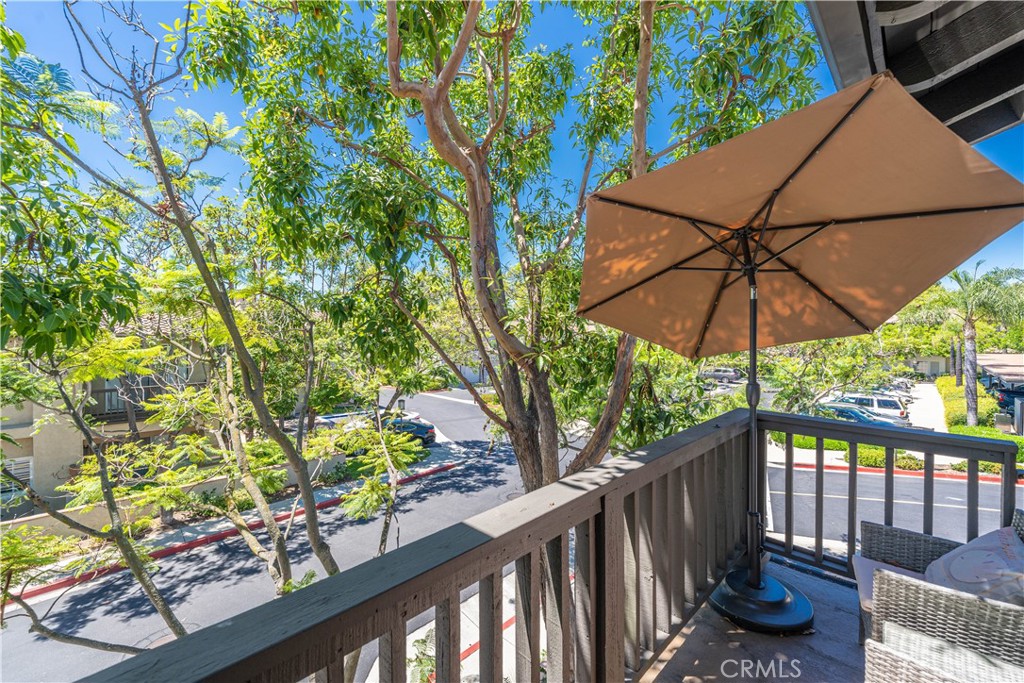 102 Vía Contento Rancho Santa Margarita, CA 92688 - Photo 25 of 40 a view of a two chairs with an umbrella