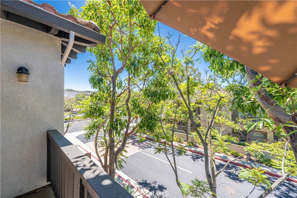 102 Vía Contento Rancho Santa Margarita, CA 92688 - Photo 26 of 40 a backyard of a house with lots of green space
