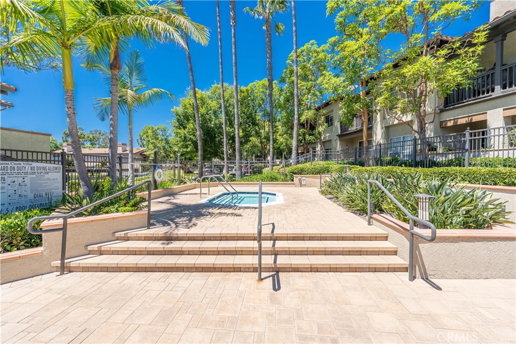 102 Vía Contento Rancho Santa Margarita, CA 92688 - Photo 30 of 40 a view of backyard with swimming pool and seating space