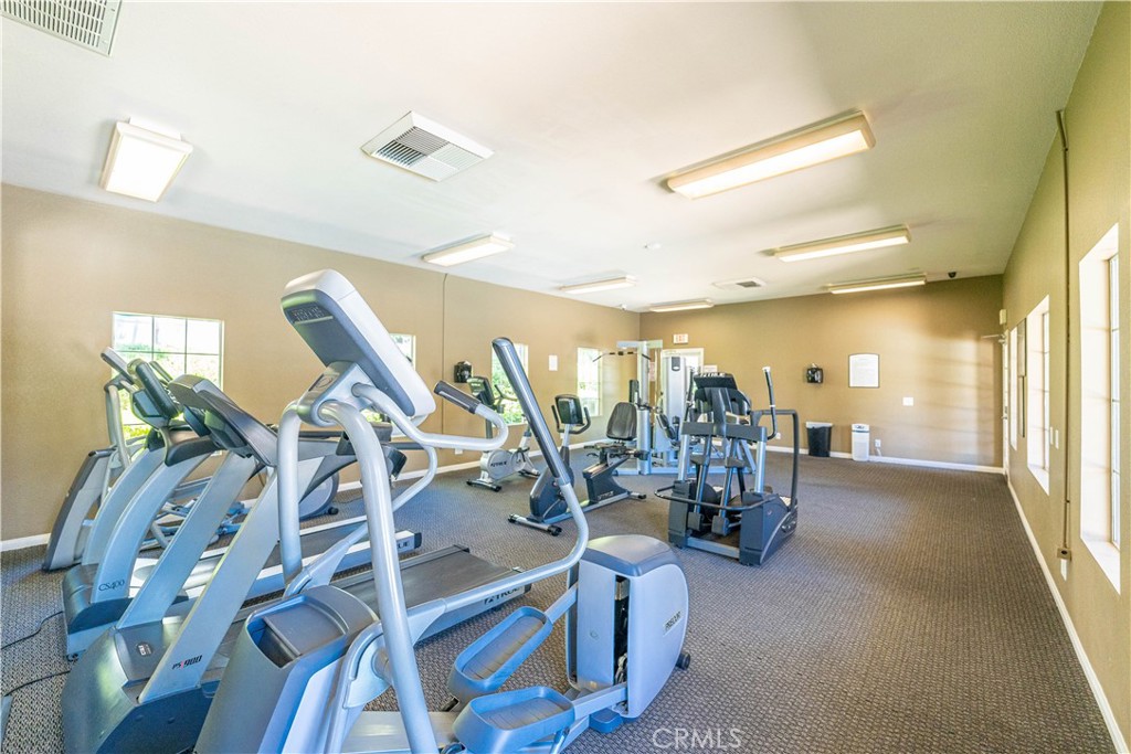 102 Vía Contento Rancho Santa Margarita, CA 92688 - Photo 34 of 40 a view of a room with gym equipment