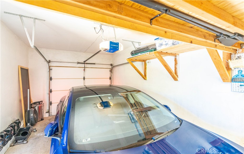 102 Vía Contento Rancho Santa Margarita, CA 92688 - Photo 36 of 40 a view of a room with wooden floor and windows