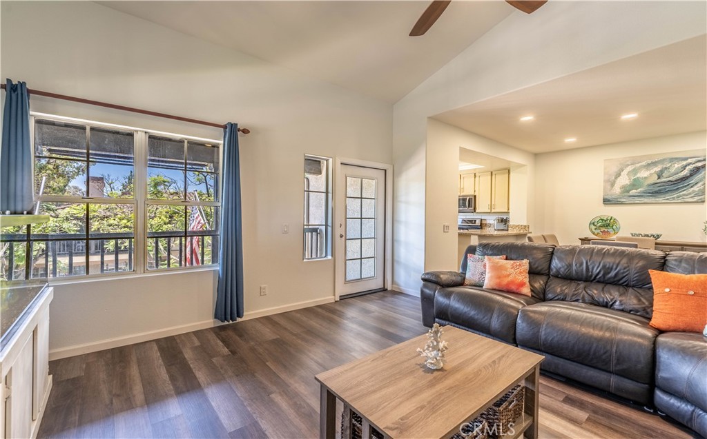 102 Vía Contento Rancho Santa Margarita, CA 92688 - Photo 10 of 40 a living room with furniture and a wooden floor