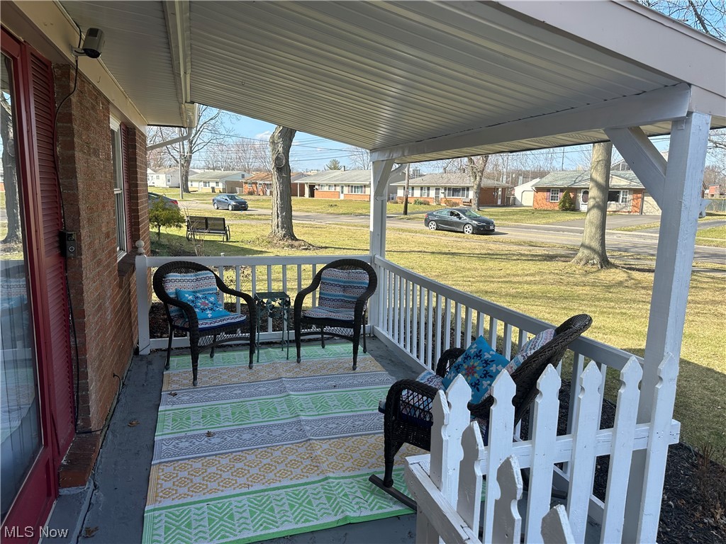 4473 Burkey Road Youngstown, OH 44515 - Photo 2 of 27 Wooden deck featuring a yard