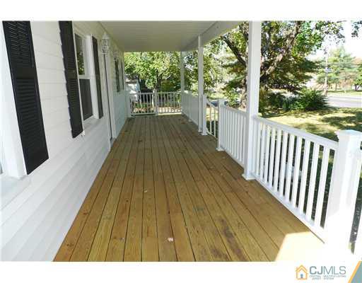 541 Georges Road Dayton, NJ 08810 - Photo 3 of 24 a view of balcony with wooden floor