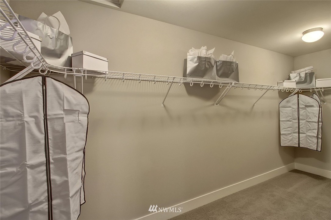 22323 43rd Drive Southeast Bothell, WA 98021 - Photo 8 of 15 a view of a room with racks on the wall
