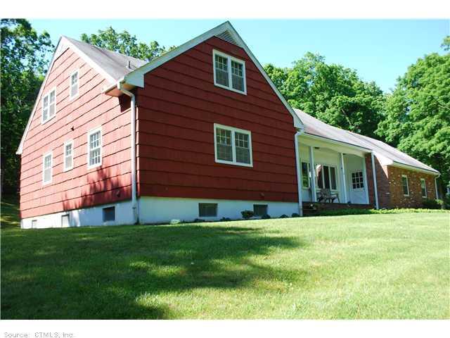 6 Sugarloaf Road Newtown, CT 06482 - Photo 1 of 1 a view of a house with a yard