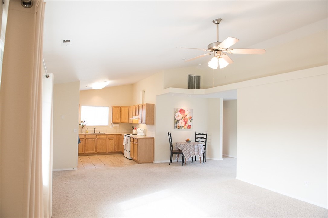 175110 West Byron Road Prosser, WA 99350 - Photo 3 of 29 a view of a livingroom with a furniture and chandelier fan