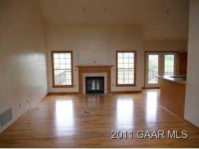81 Liberty School Road Mount Sidney, VA 24467 - Photo 6 of 11 an empty room with wooden floor and windows