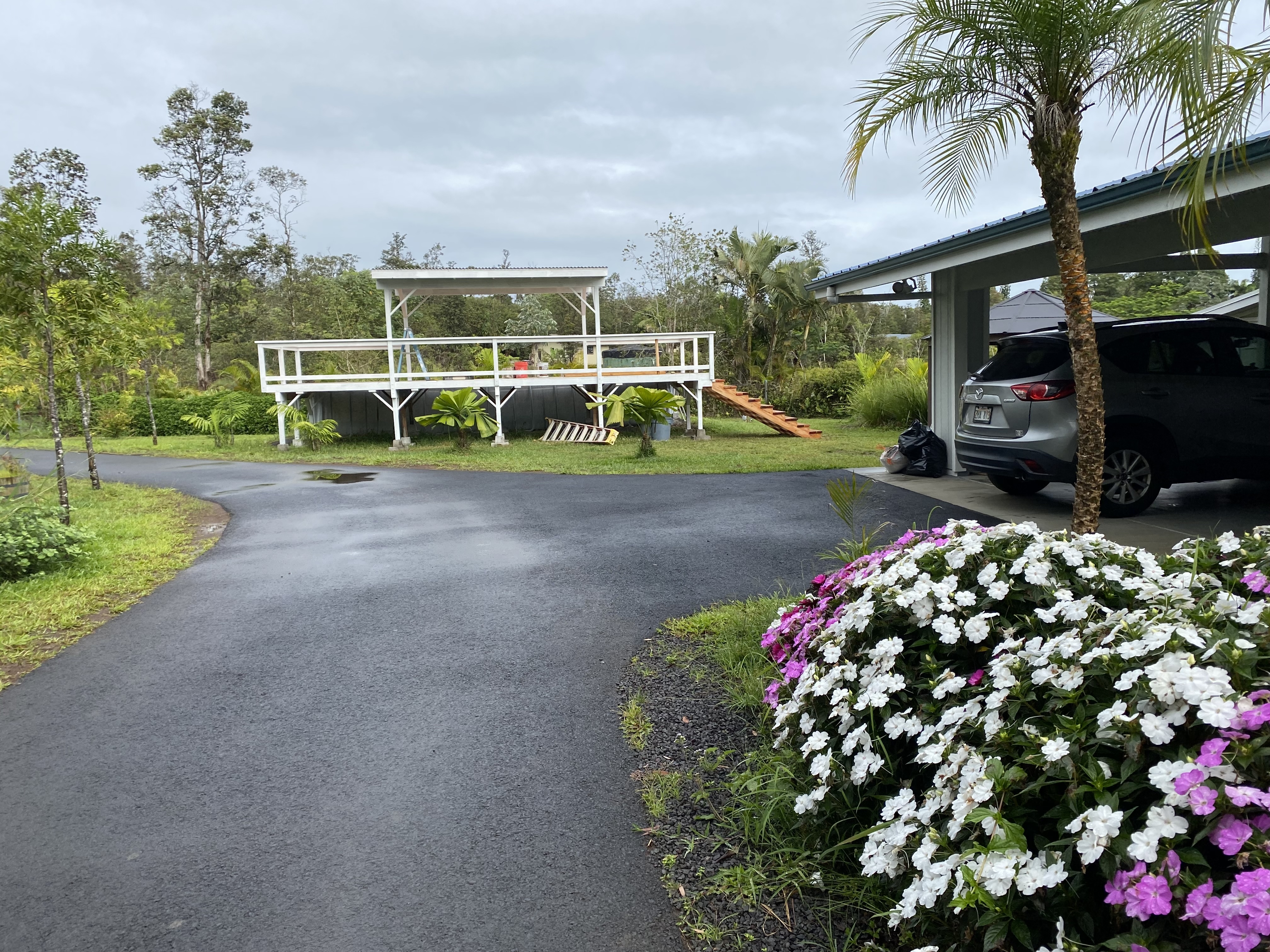 16-1321 Moho Road Keaau, HI 96749 - Photo 11 of 19 a front view of a house with garden