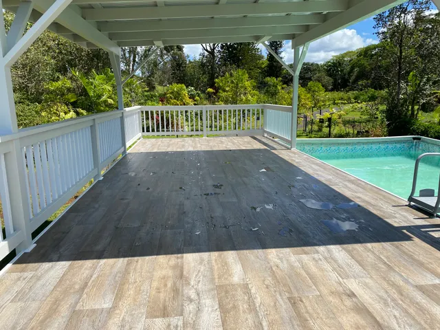 a view of backyard with green space