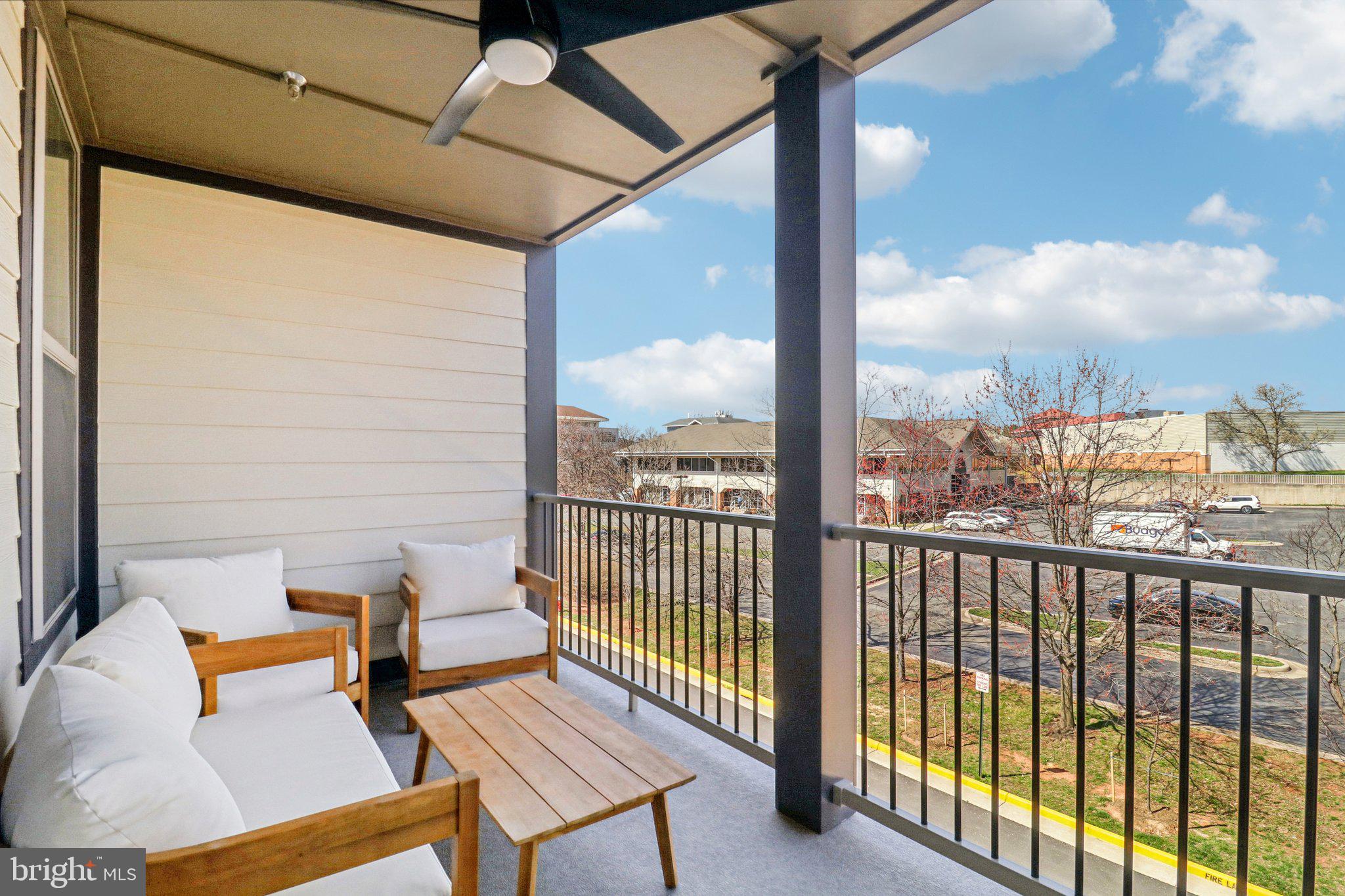 45916 Swallow Terrace Sterling, VA 20165 - Photo 17 of 41 a view of a balcony with chairs