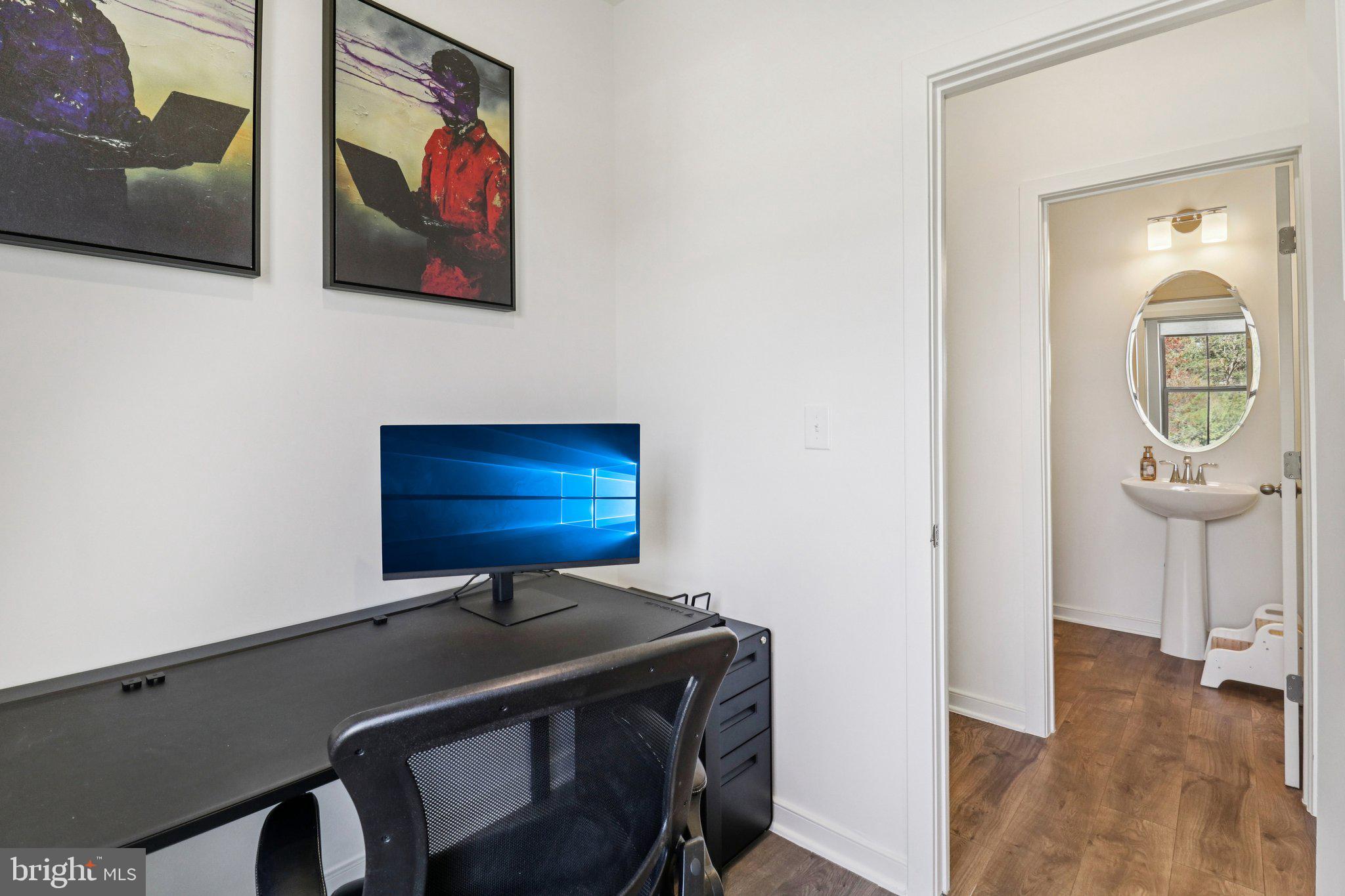 45916 Swallow Terrace Sterling, VA 20165 - Photo 20 of 41 a view of a hallway with workspace