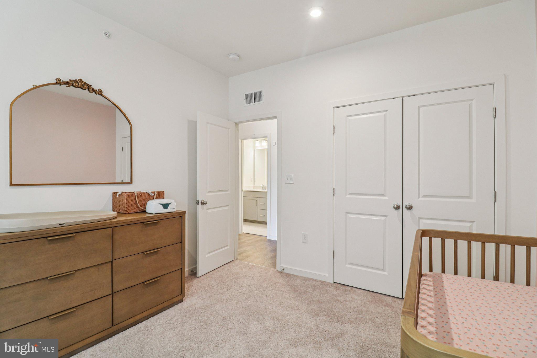 45916 Swallow Terrace Sterling, VA 20165 - Photo 30 of 41 a bathroom with a sink and mirror