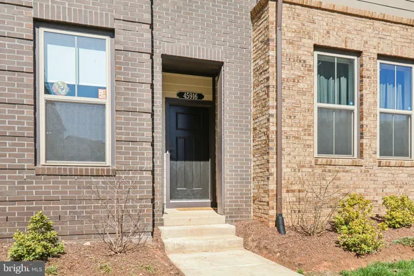 a front view of a brick building
