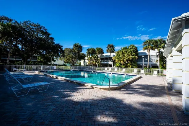 a view of a house with swimming pool