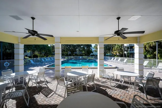 a view of house with outdoor seating yard