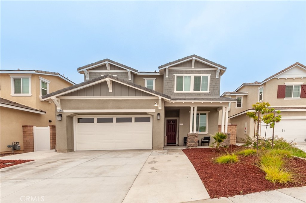 27283 Chase Road Menifee, CA 92584 - Photo 1 of 16 a front view of a house with a yard
