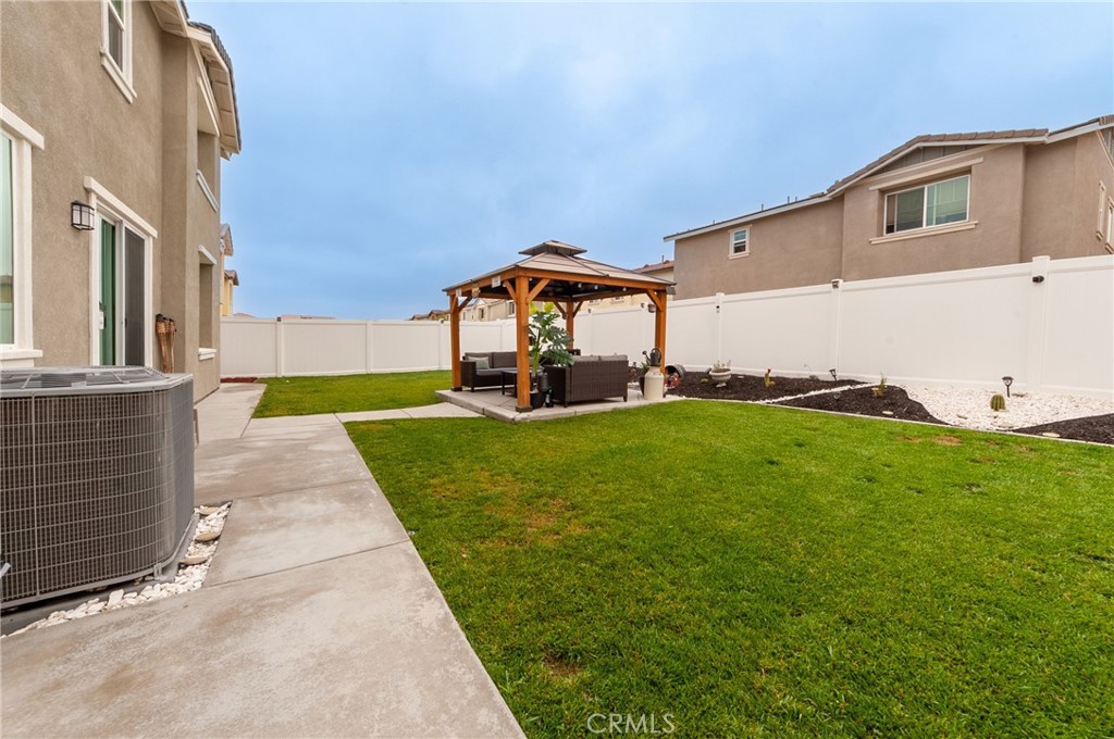 27283 Chase Road Menifee, CA 92584 - Photo 16 of 16 a front view of a house with a yard