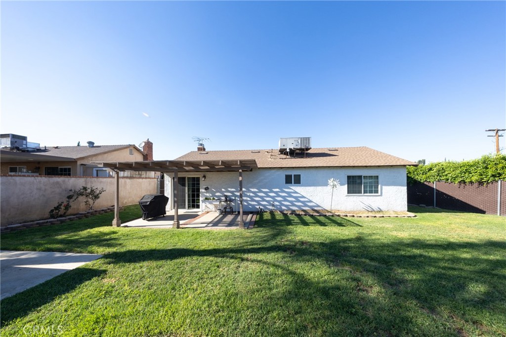10514 Cameo Court Riverside, CA 92505 - Photo 28 of 30 a view of a house with a big yard and large trees