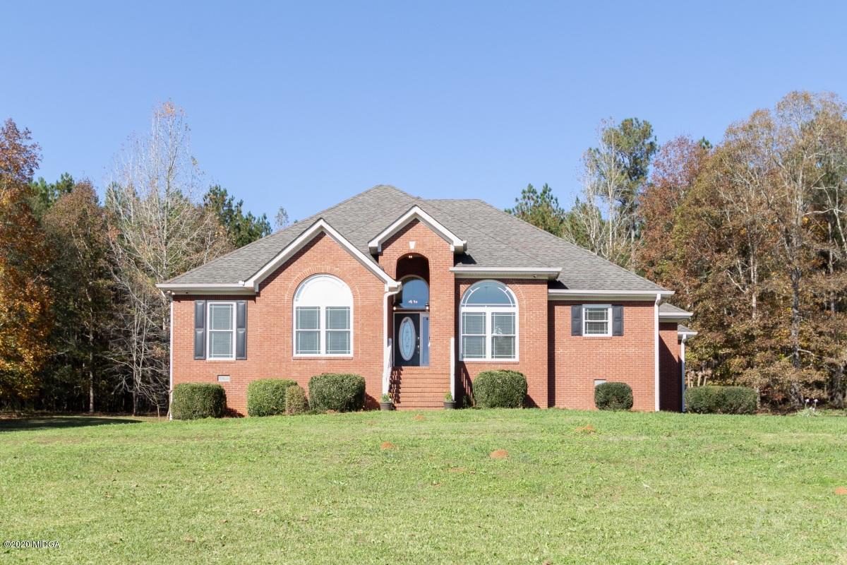 132 Brook Road Barnesville, GA 30204 - Photo 1 of 33 a front view of a house with a yard