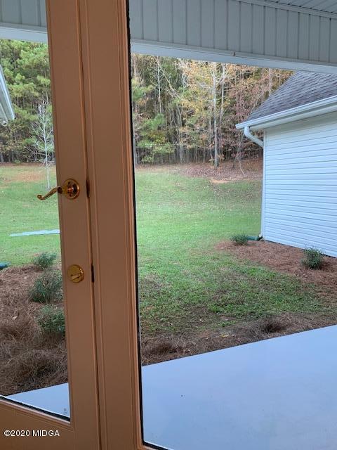 132 Brook Road Barnesville, GA 30204 - Photo 11 of 33 a view of a backyard of the house