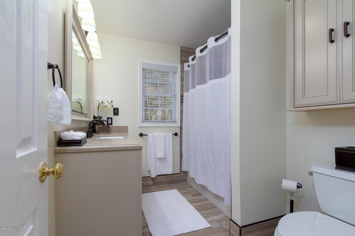 132 Brook Road Barnesville, GA 30204 - Photo 27 of 33 a bathroom with a sink toilet and shower