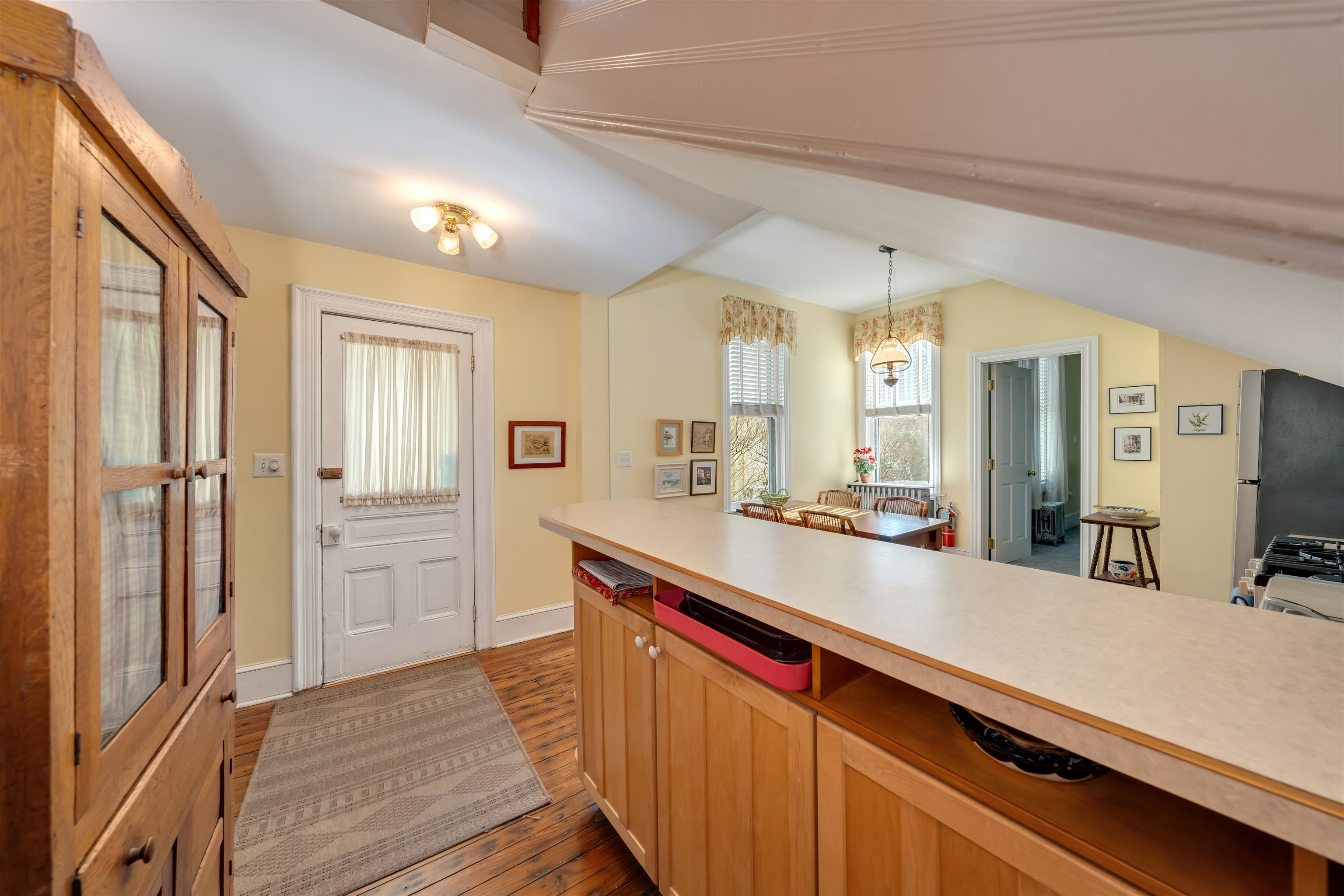 130 Decatur Street Cape May, NJ 08204 - Photo 13 of 50 a kitchen with stainless steel appliances a sink and refrigerator