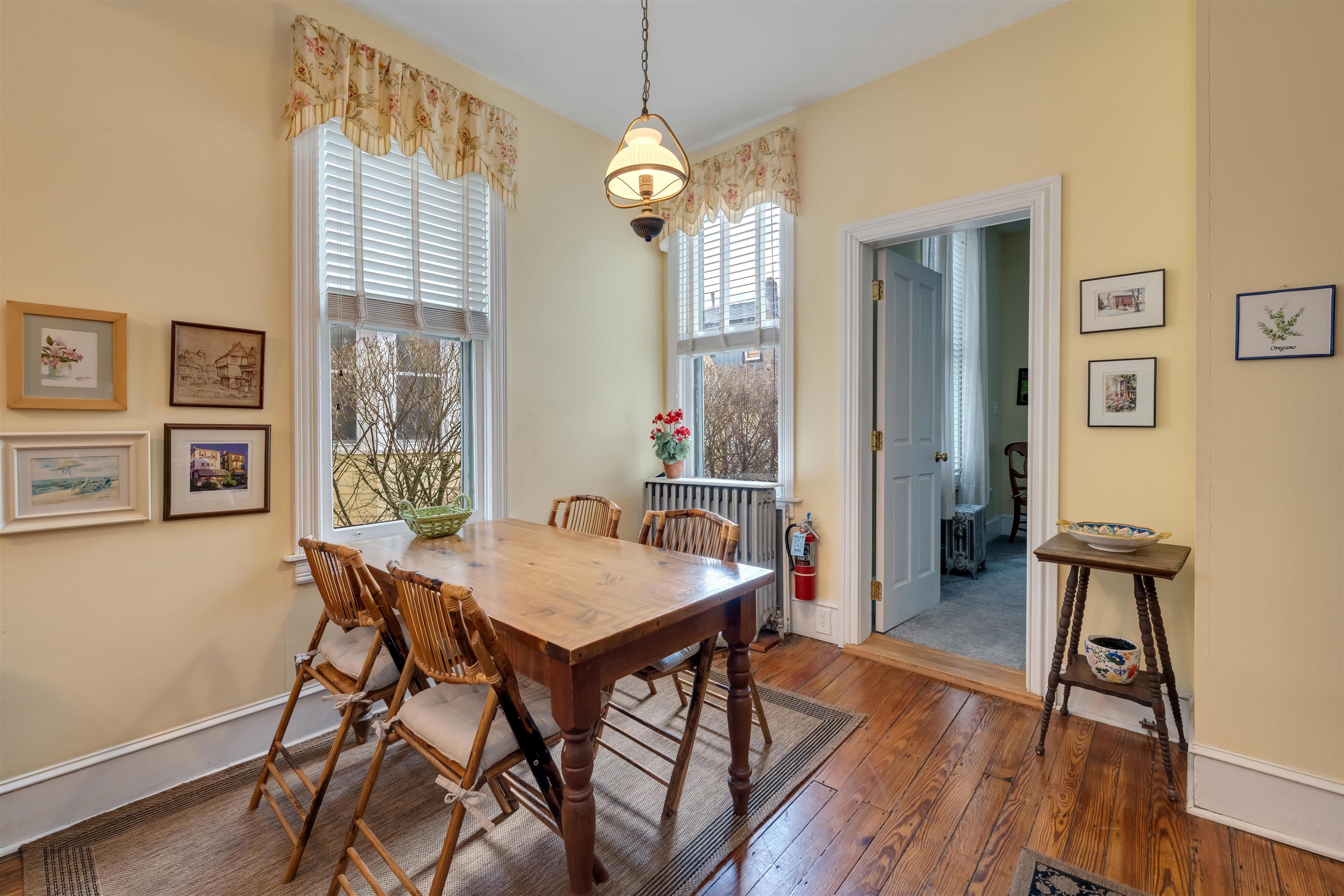 130 Decatur Street Cape May, NJ 08204 - Photo 16 of 50 a view of a dining room with furniture window and wooden floor