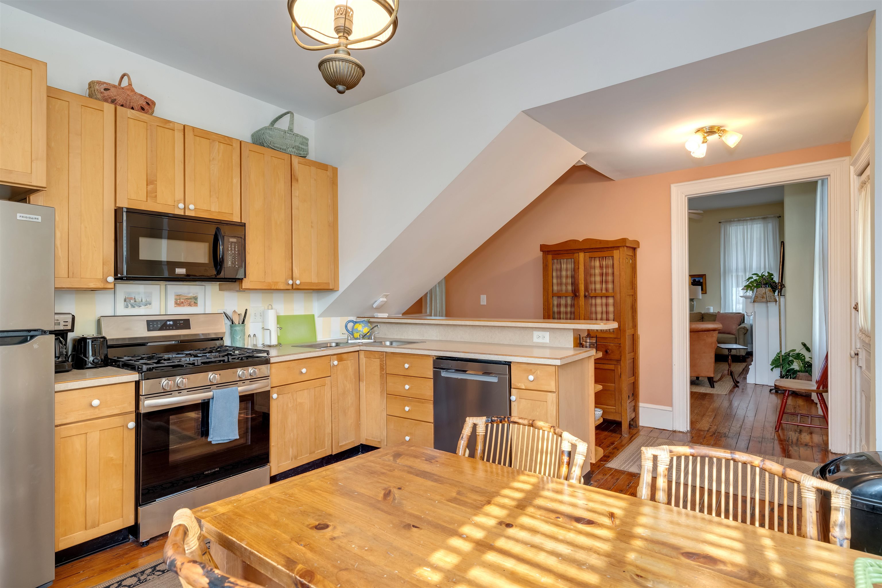 130 Decatur Street Cape May, NJ 08204 - Photo 18 of 50 a open kitchen with stainless steel appliances granite countertop a stove and a sink