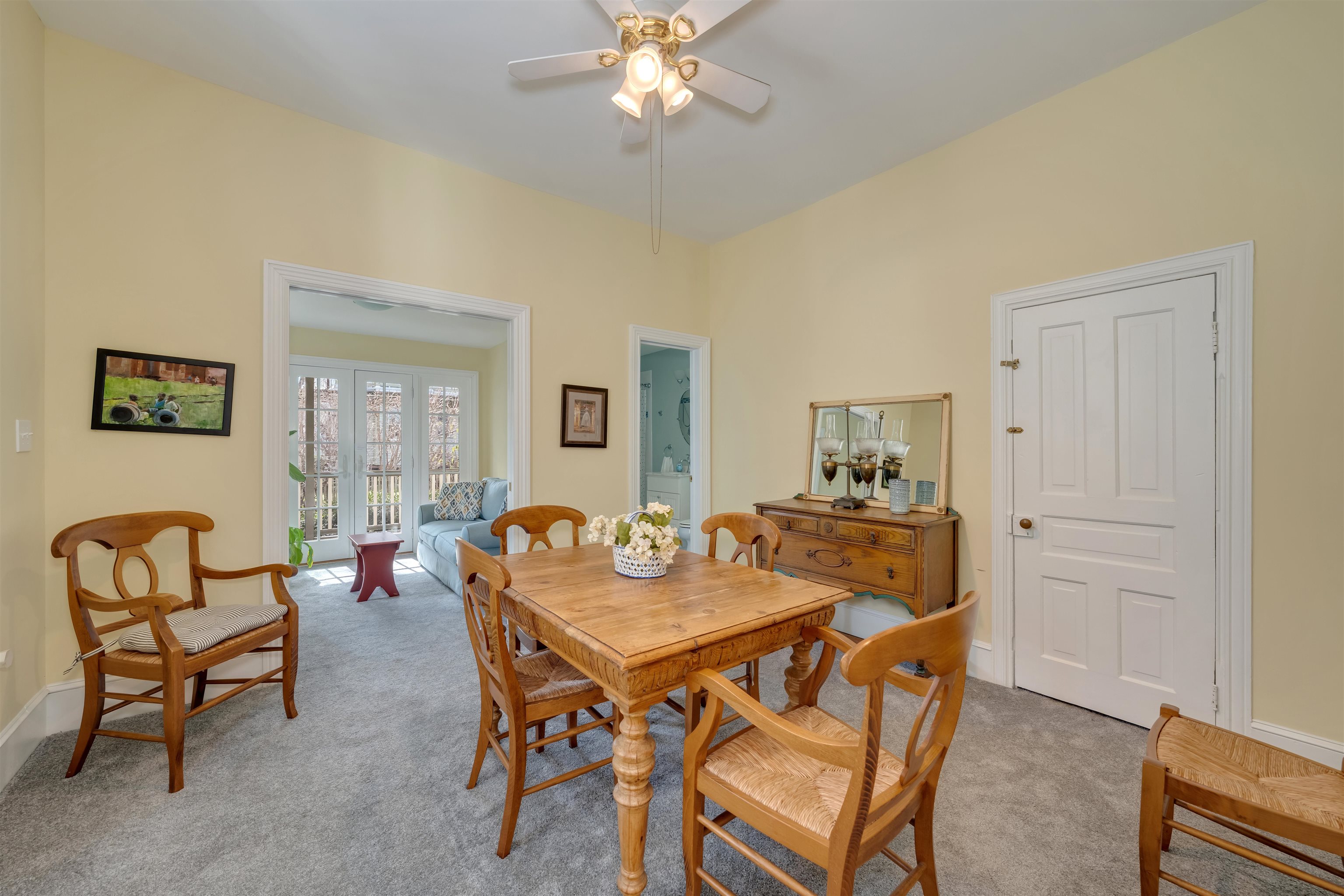 130 Decatur Street Cape May, NJ 08204 - Photo 20 of 50 a view of a dining room with furniture and chandelier