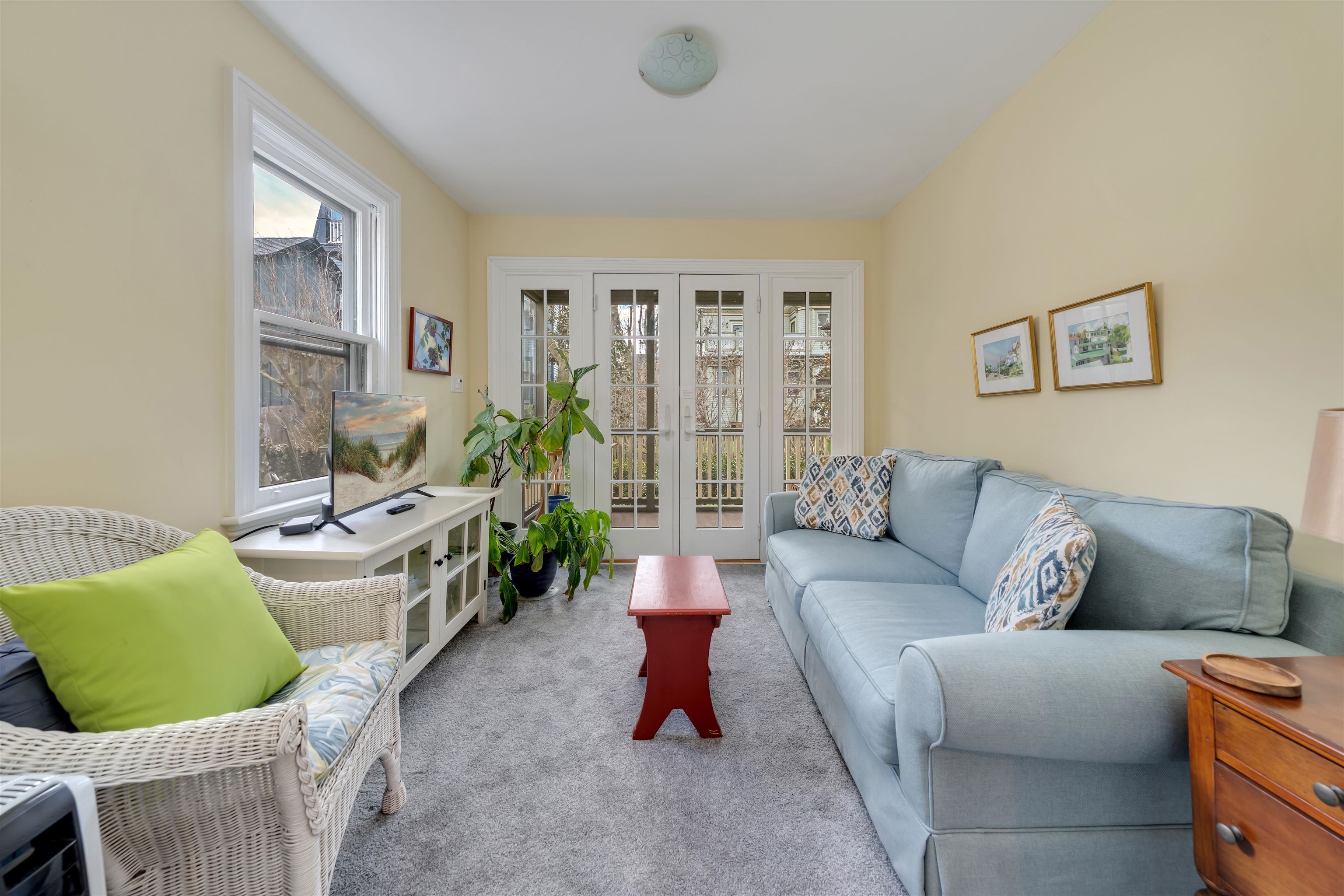 130 Decatur Street Cape May, NJ 08204 - Photo 22 of 50 a living room with furniture and a large window