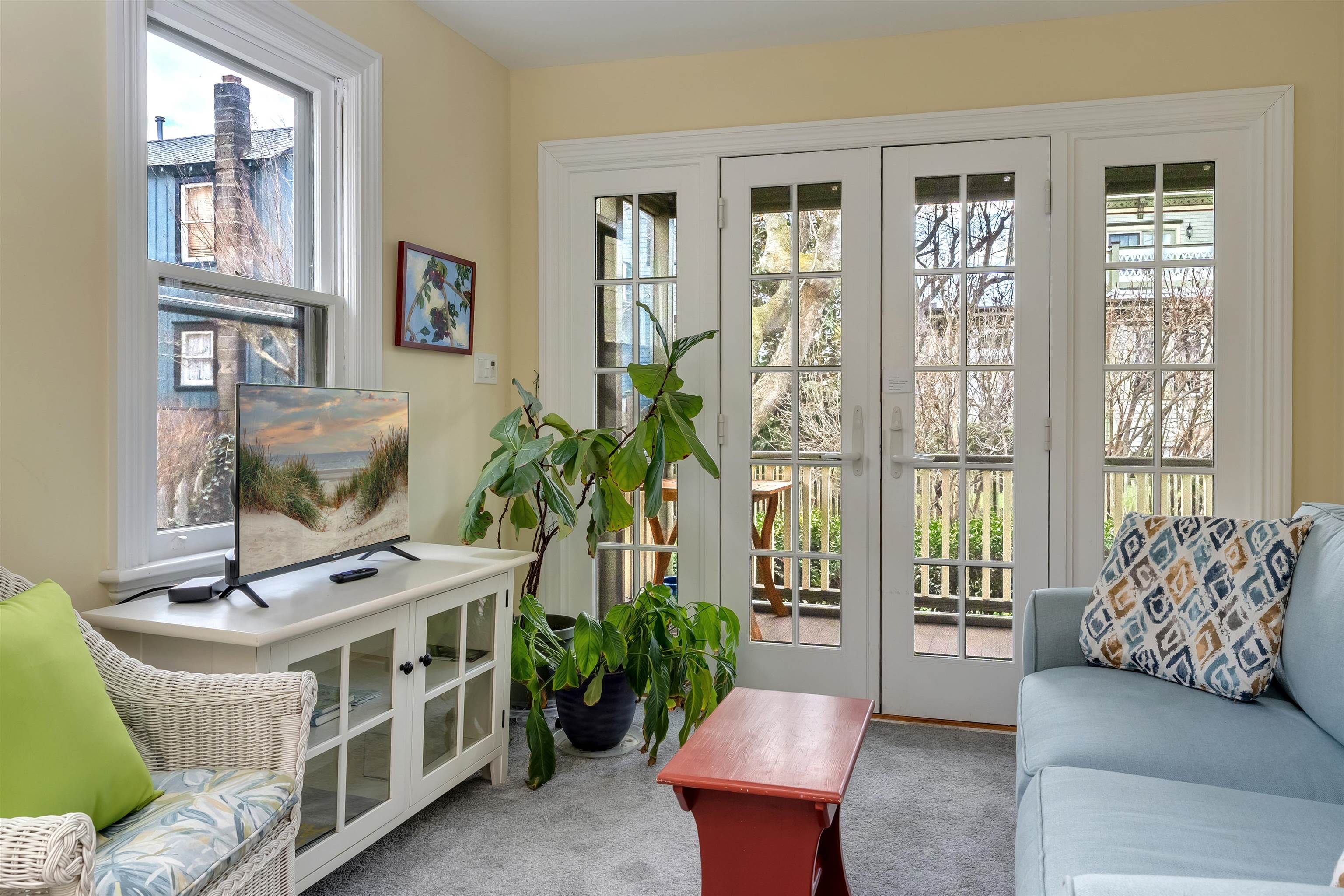 130 Decatur Street Cape May, NJ 08204 - Photo 23 of 50 a living room with furniture and a floor to ceiling window