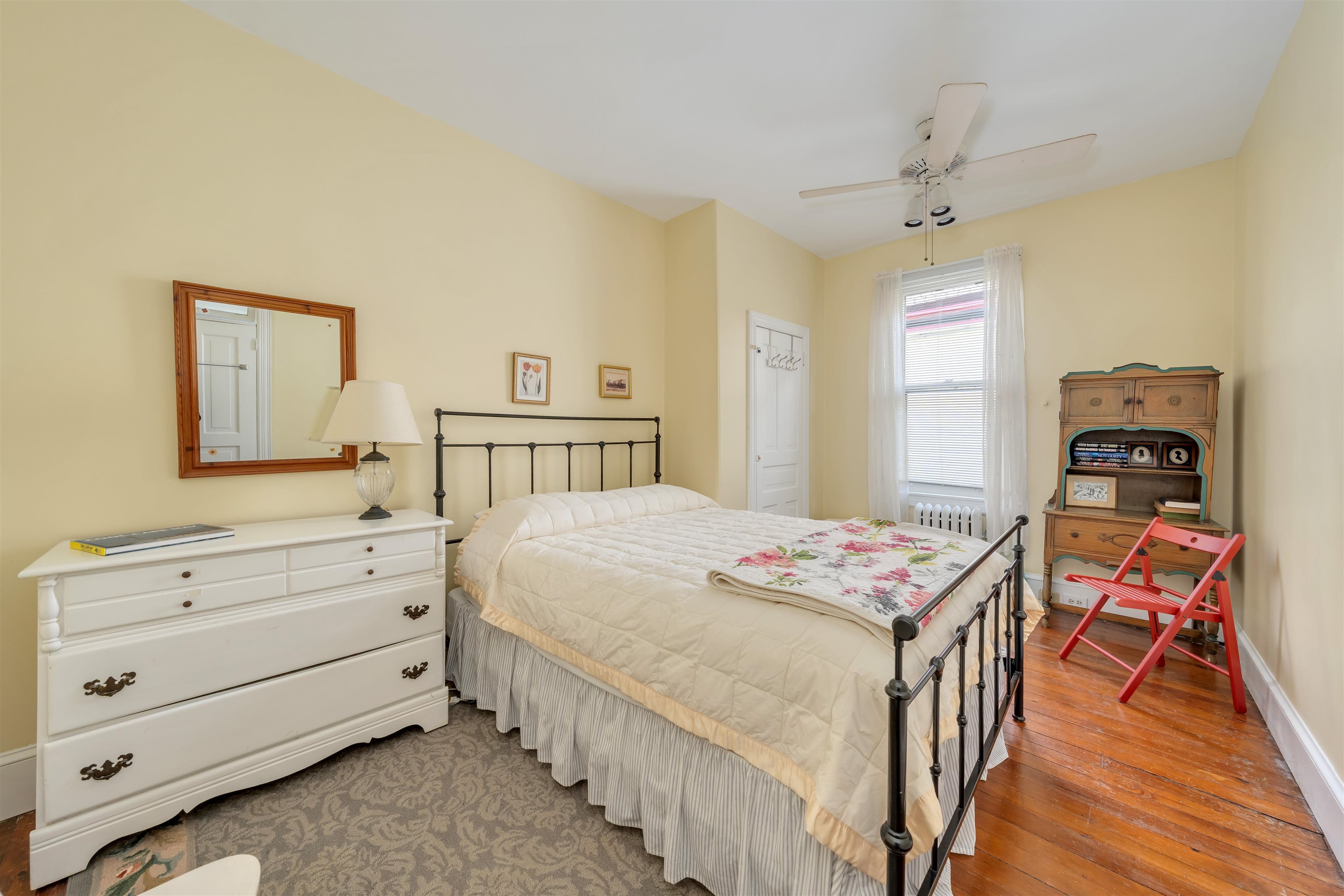130 Decatur Street Cape May, NJ 08204 - Photo 28 of 50 a bedroom with a bed and a dresser