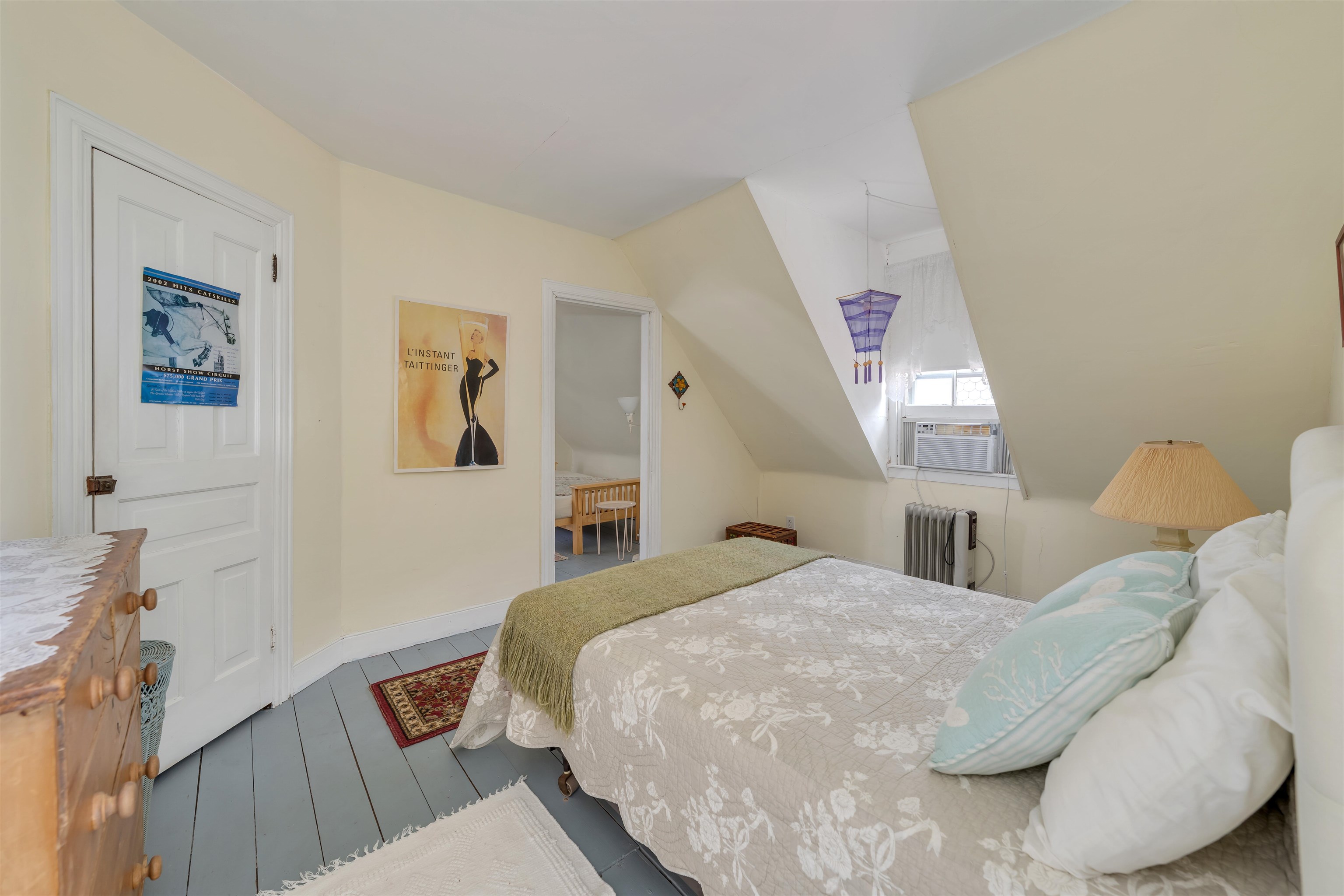 130 Decatur Street Cape May, NJ 08204 - Photo 38 of 50 a bedroom with a bed and wooden floor