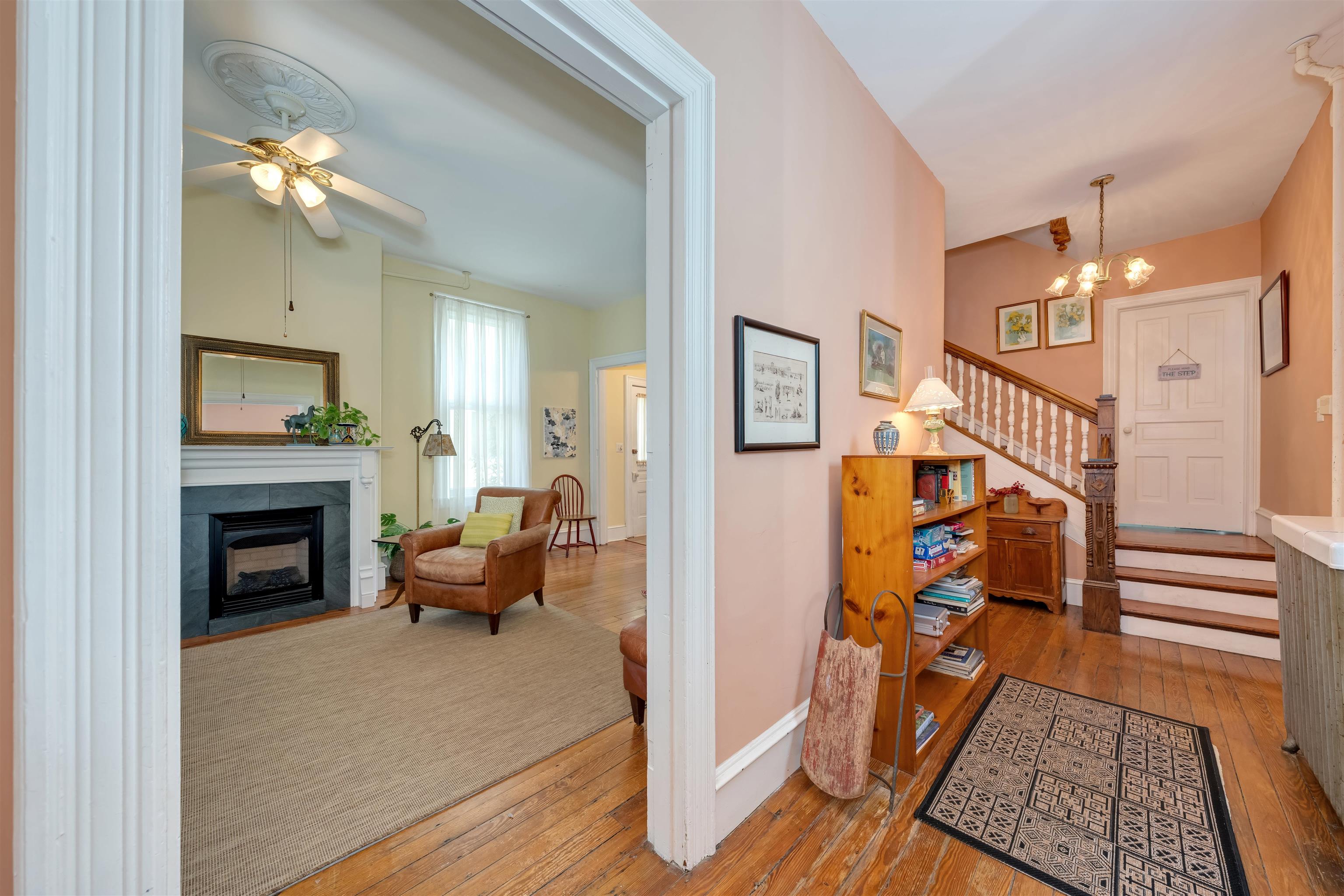 130 Decatur Street Cape May, NJ 08204 - Photo 7 of 50 a living room with furniture and a fireplace