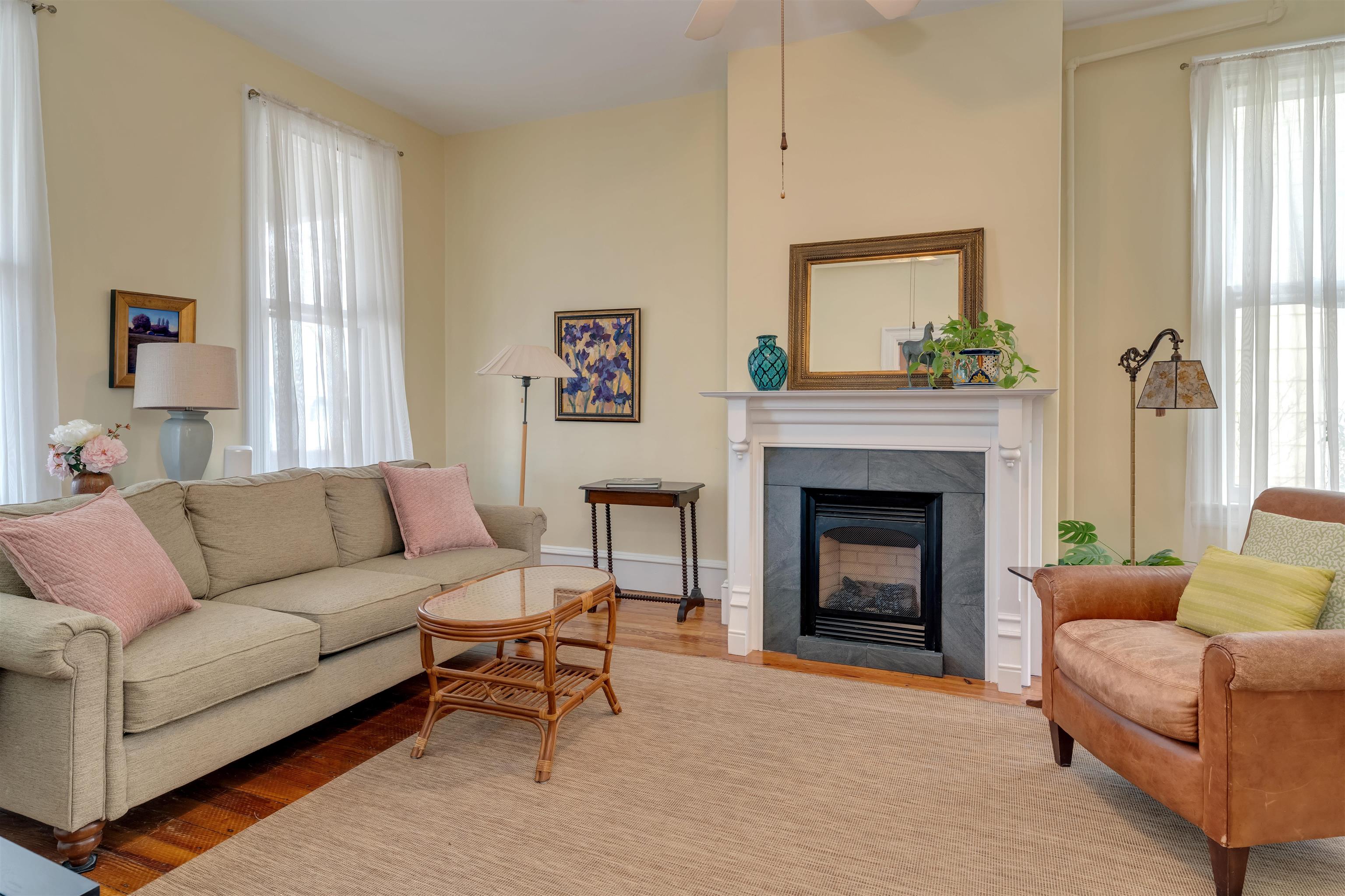 130 Decatur Street Cape May, NJ 08204 - Photo 9 of 50 a living room with furniture and a fireplace