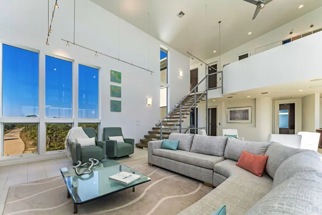 a kitchen with stainless steel appliances granite countertop a sink and a stove