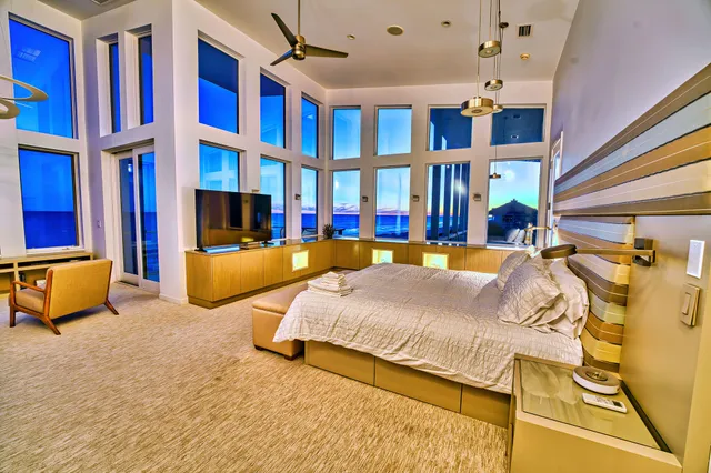 a bathroom with a double vanity sink mirror and shower