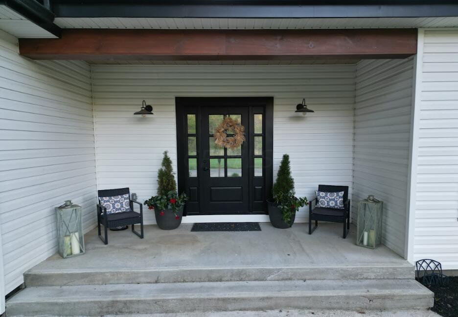 84 Merritt Road Southwest Pataskala, OH 43062 - Photo 17 of 24 Cement front porch, wood beams, modern f
