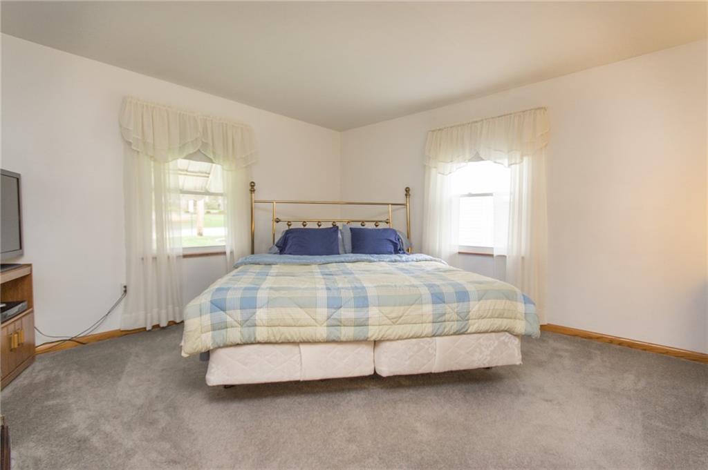 70 Darlington Road Patterson Heights, PA 15010 - Photo 11 of 20 The Master bedrooms is generously sized at 14x14 and offers abundant natural light! The wood trim complements the wood doors throughout the home!